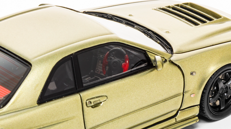 Despite being a sealed resin model, Ignition Model has given plenty of attention to the interior. Mmm, red “Alcantara”...